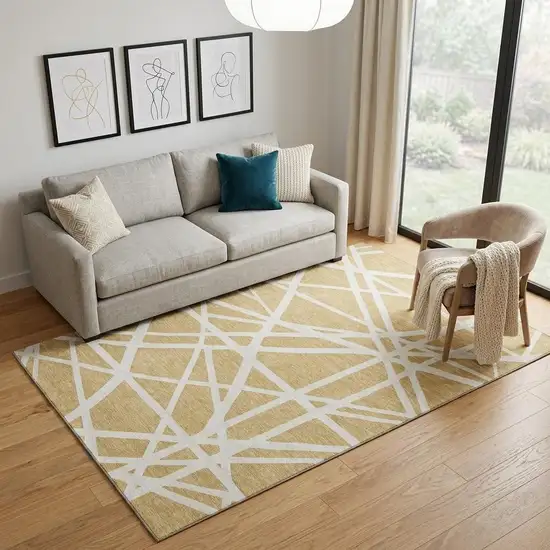 Gold And Ivory Geometric Washable Area Rug With UV Protection Photo 1
