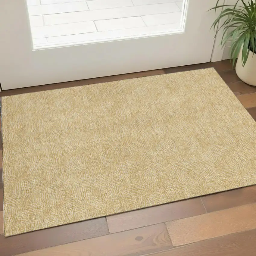 Gold And Ivory Geometric Washable Area Rug With UV Protection Photo 1