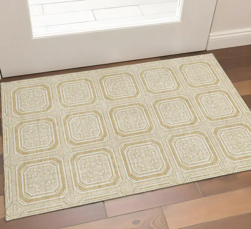 Gold And Ivory Geometric Washable Area Rug With UV Protection Photo 1