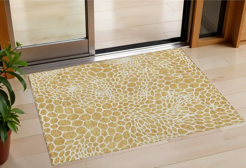 Gold And Ivory Geometric Washable Indoor Outdoor Area Rug Photo 1