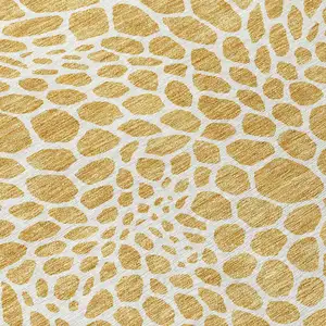 Photo of Gold And Ivory Geometric Washable Indoor Outdoor Area Rug