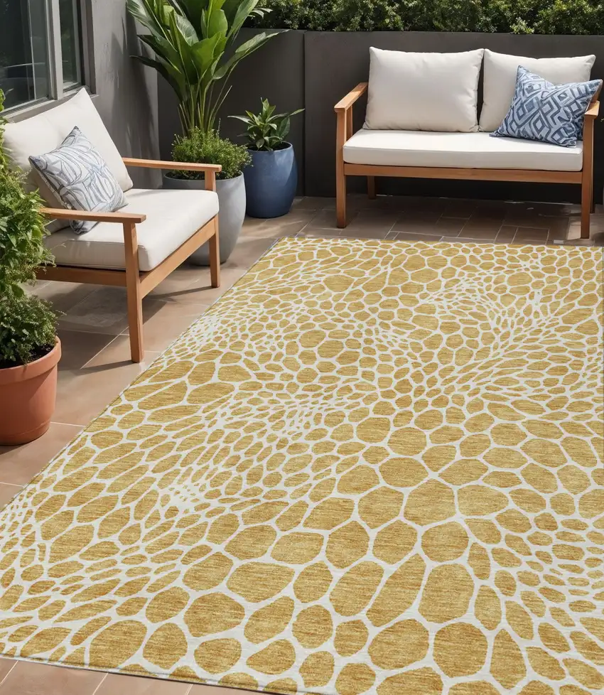 Gold And Ivory Geometric Washable Indoor Outdoor Area Rug Photo 1