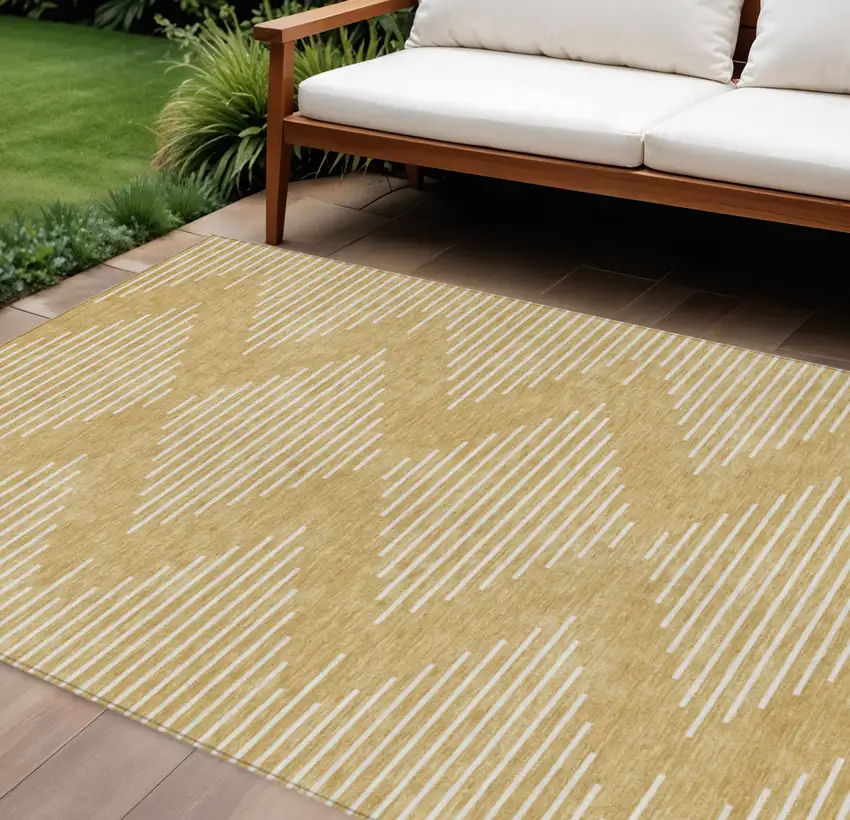 Gold And Ivory Geometric Washable Indoor Outdoor Area Rug Photo 1
