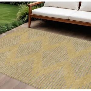 Photo of Gold And Ivory Geometric Washable Indoor Outdoor Area Rug