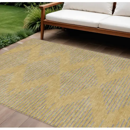 Gold And Ivory Geometric Washable Indoor Outdoor Area Rug Photo 1