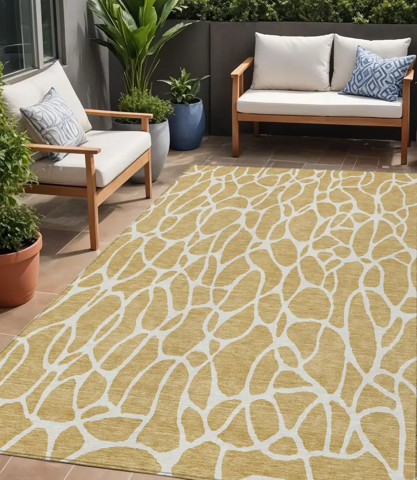 Gold And Ivory Geometric Washable Indoor Outdoor Area Rug Photo 1