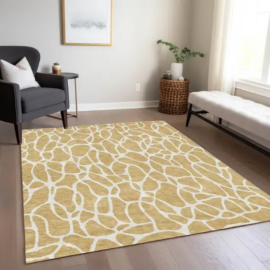 Gold And Ivory Geometric Washable Indoor Outdoor Area Rug Photo 9
