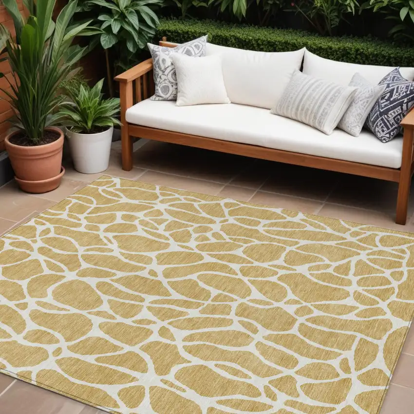 Gold And Ivory Geometric Washable Indoor Outdoor Area Rug Photo 1