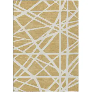 Photo of Gold And Ivory Geometric Washable Indoor Outdoor Area Rug