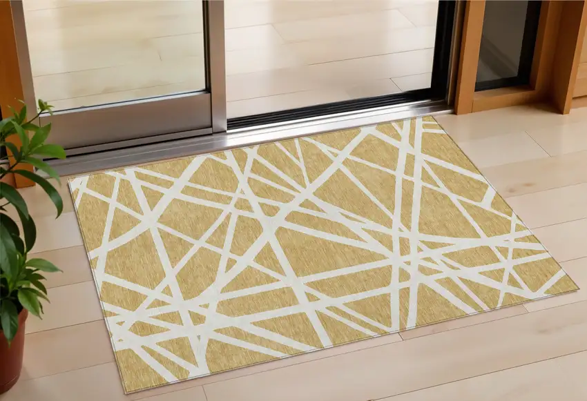 Gold And Ivory Geometric Washable Indoor Outdoor Area Rug Photo 1
