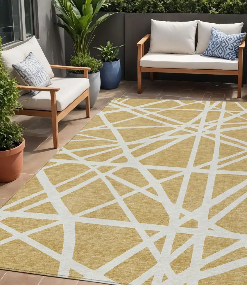 Gold And Ivory Geometric Washable Indoor Outdoor Area Rug Photo 1