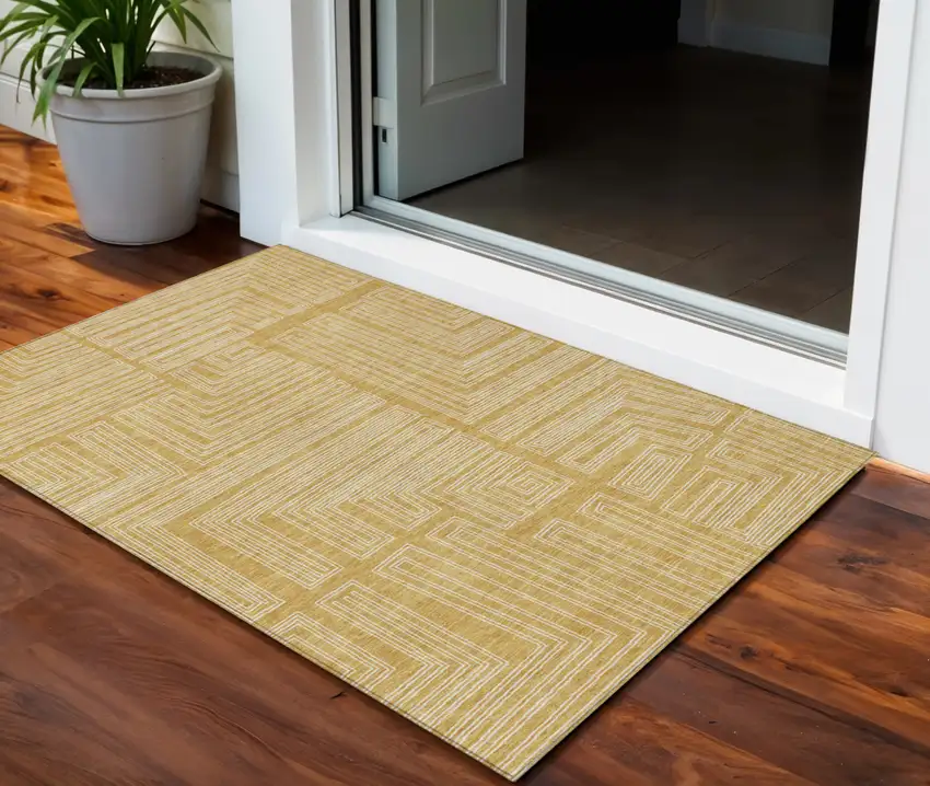 Gold And Ivory Geometric Washable Indoor Outdoor Area Rug Photo 1