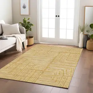 Photo of Gold And Ivory Geometric Washable Indoor Outdoor Area Rug