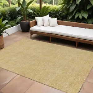 Photo of Gold And Ivory Geometric Washable Indoor Outdoor Area Rug