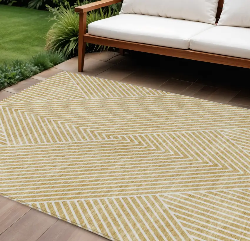 Gold And Ivory Geometric Washable Indoor Outdoor Area Rug Photo 1