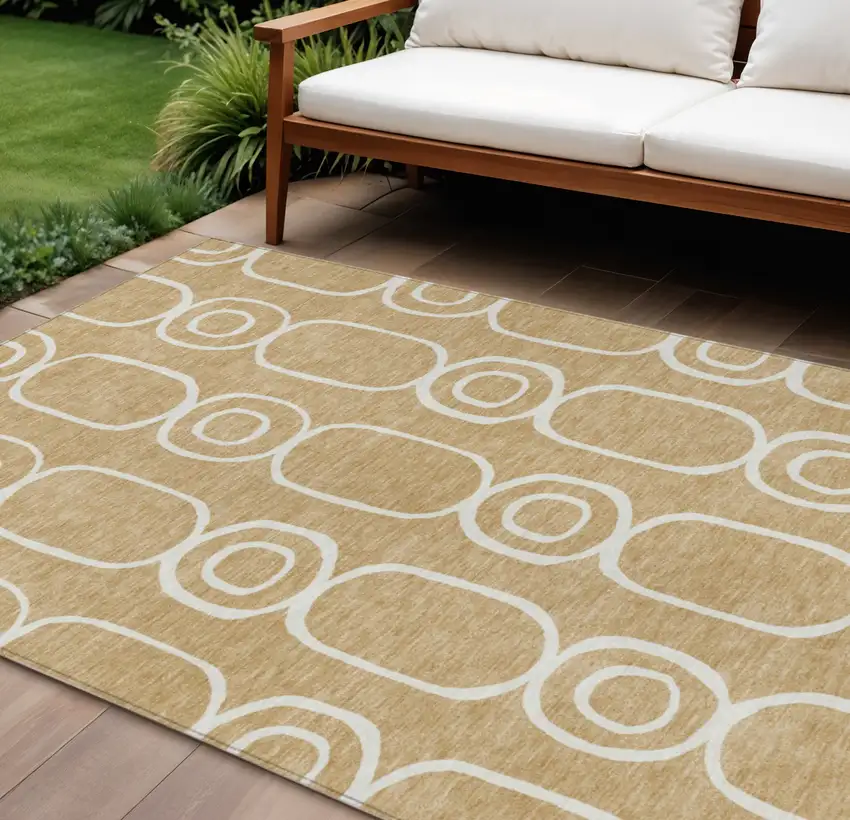 Gold And Ivory Geometric Washable Indoor Outdoor Area Rug Photo 1