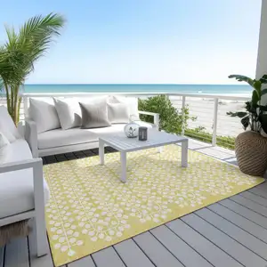 Photo of Gold And Ivory Geometric Washable Indoor Outdoor Area Rug