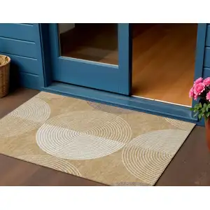 Photo of Gold And Ivory Geometric Washable Indoor Outdoor Area Rug