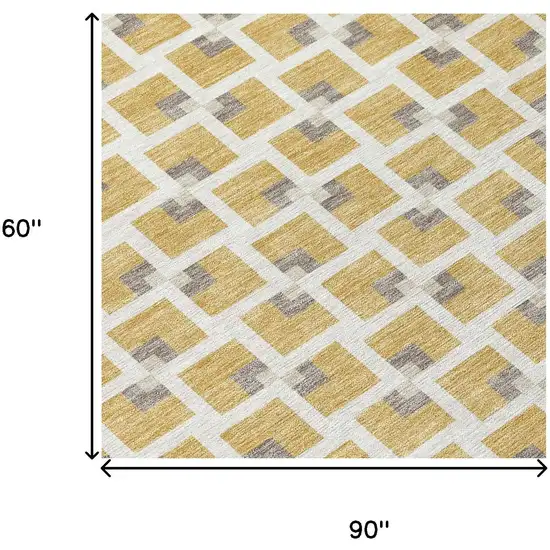 Gold And Ivory Geometric Washable Indoor Outdoor Area Rug Photo 6