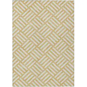 Photo of Gold And Ivory Geometric Washable Indoor Outdoor Area Rug