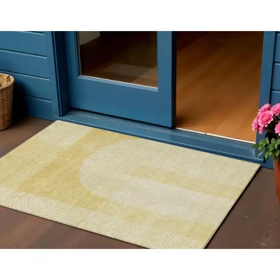 Gold And Ivory Geometric Washable Indoor Outdoor Area Rug Photo 1