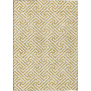 Photo of Gold And Ivory Geometric Washable Indoor Outdoor Area Rug