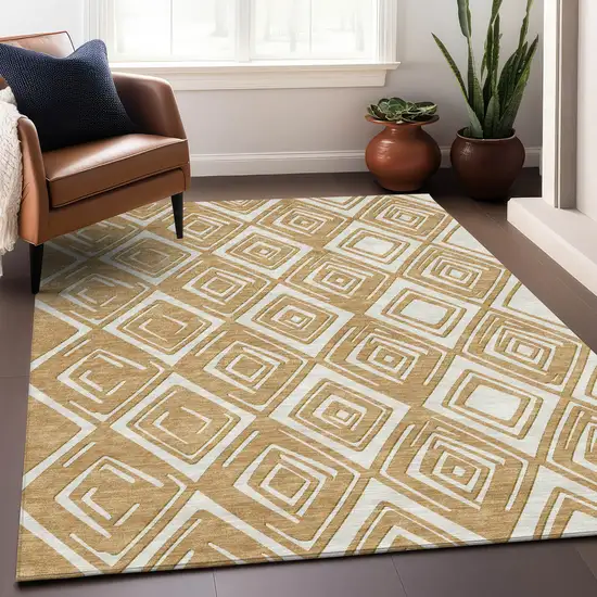 Gold And Ivory Geometric Washable Indoor Outdoor Area Rug Photo 9