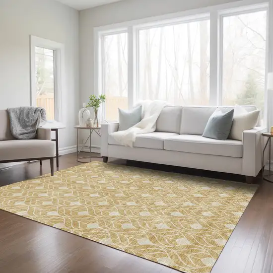 Gold And Ivory Geometric Washable Indoor Outdoor Area Rug Photo 9