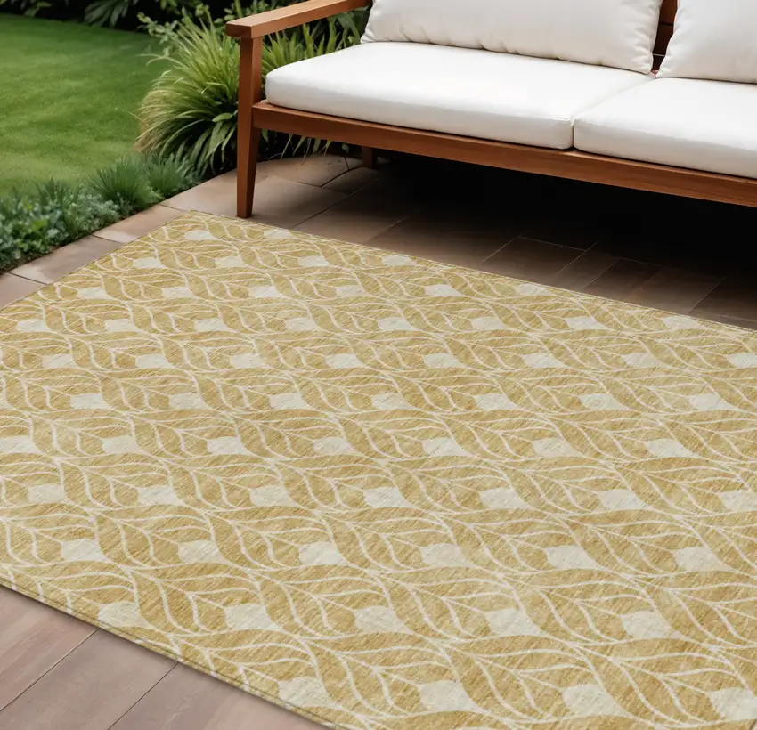 Gold And Ivory Geometric Washable Indoor Outdoor Area Rug Photo 1
