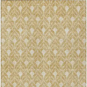 Photo of Gold And Ivory Geometric Washable Indoor Outdoor Area Rug