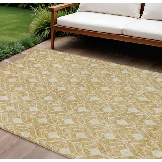 Gold And Ivory Geometric Washable Indoor Outdoor Area Rug Photo 1
