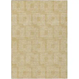 Photo of Gold And Ivory Geometric Washable Indoor Outdoor Area Rug