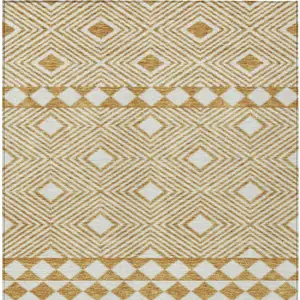 Photo of Gold And Ivory Geometric Washable Indoor Outdoor Area Rug