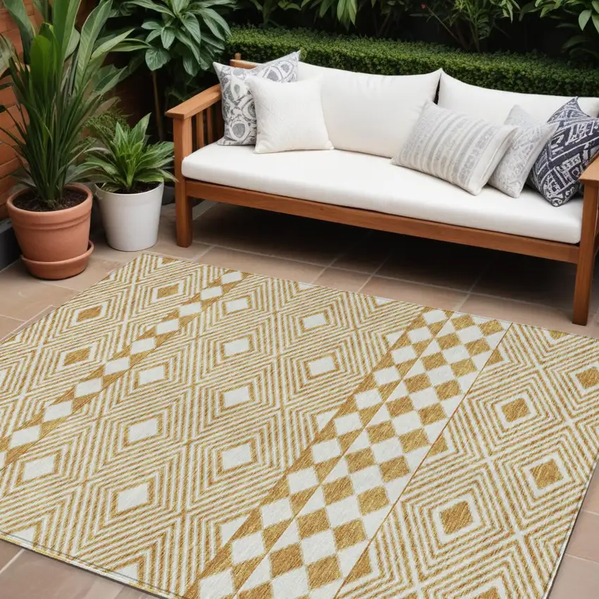 Gold And Ivory Geometric Washable Indoor Outdoor Area Rug Photo 1