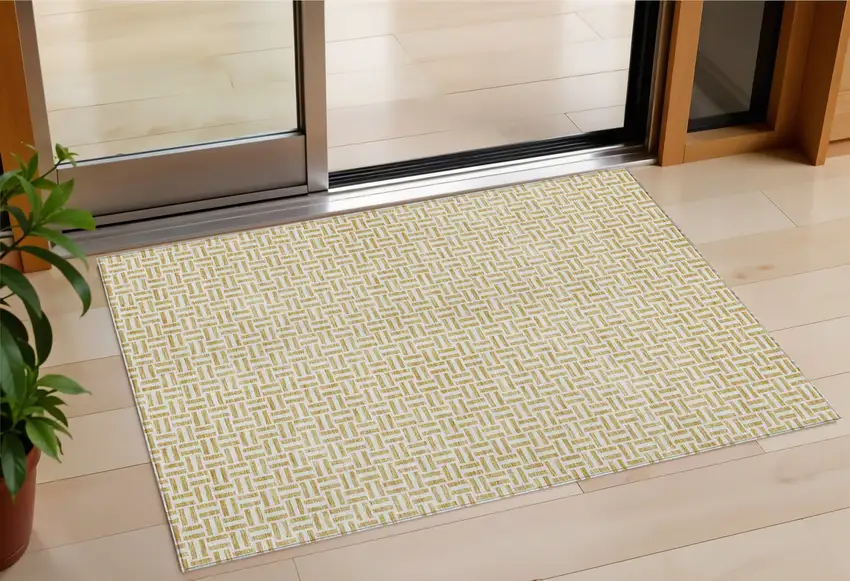 Gold And Ivory Geometric Washable Indoor Outdoor Area Rug Photo 1