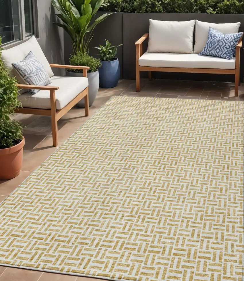 Gold And Ivory Geometric Washable Indoor Outdoor Area Rug Photo 1