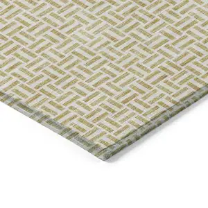 Photo of Gold And Ivory Geometric Washable Indoor Outdoor Area Rug