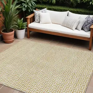 Photo of Gold And Ivory Geometric Washable Indoor Outdoor Area Rug