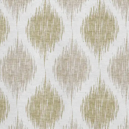 Gold And Ivory Ikat Washable Area Rug With UV Protection Photo 3