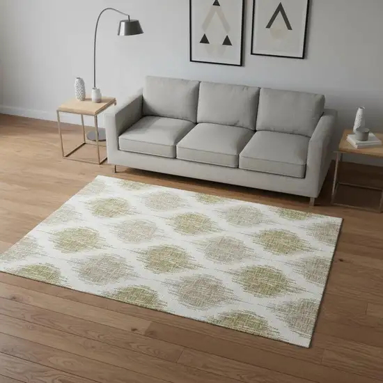 Gold And Ivory Ikat Washable Area Rug With UV Protection Photo 2