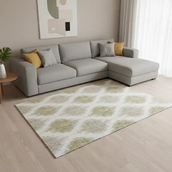 Gold And Ivory Ikat Washable Area Rug With UV Protection Photo 2