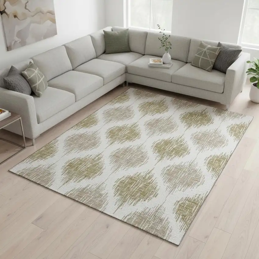 Gold And Ivory Ikat Washable Area Rug With UV Protection Photo 2