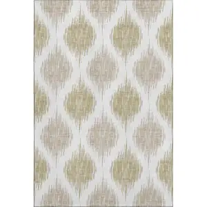 Photo of Gold And Ivory Ikat Washable Area Rug With UV Protection