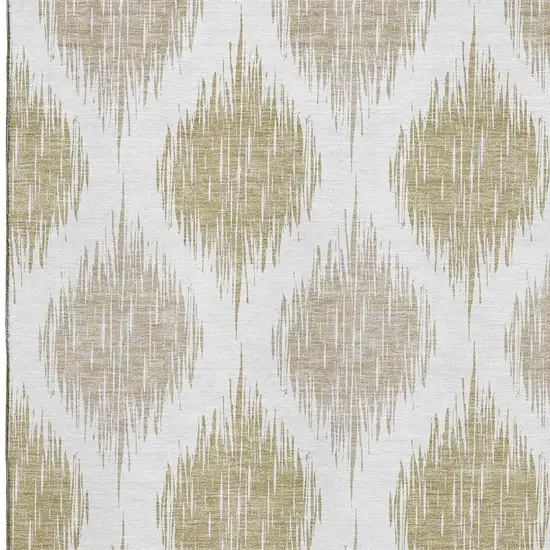 Gold And Ivory Ikat Washable Area Rug With UV Protection Photo 3
