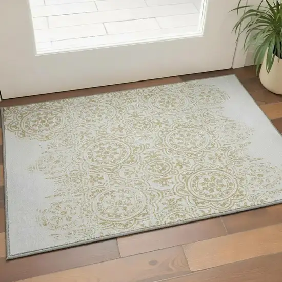 Gold And Ivory Medallion Washable Area Rug With UV Protection Photo 2