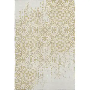 Photo of Gold And Ivory Medallion Washable Area Rug With UV Protection