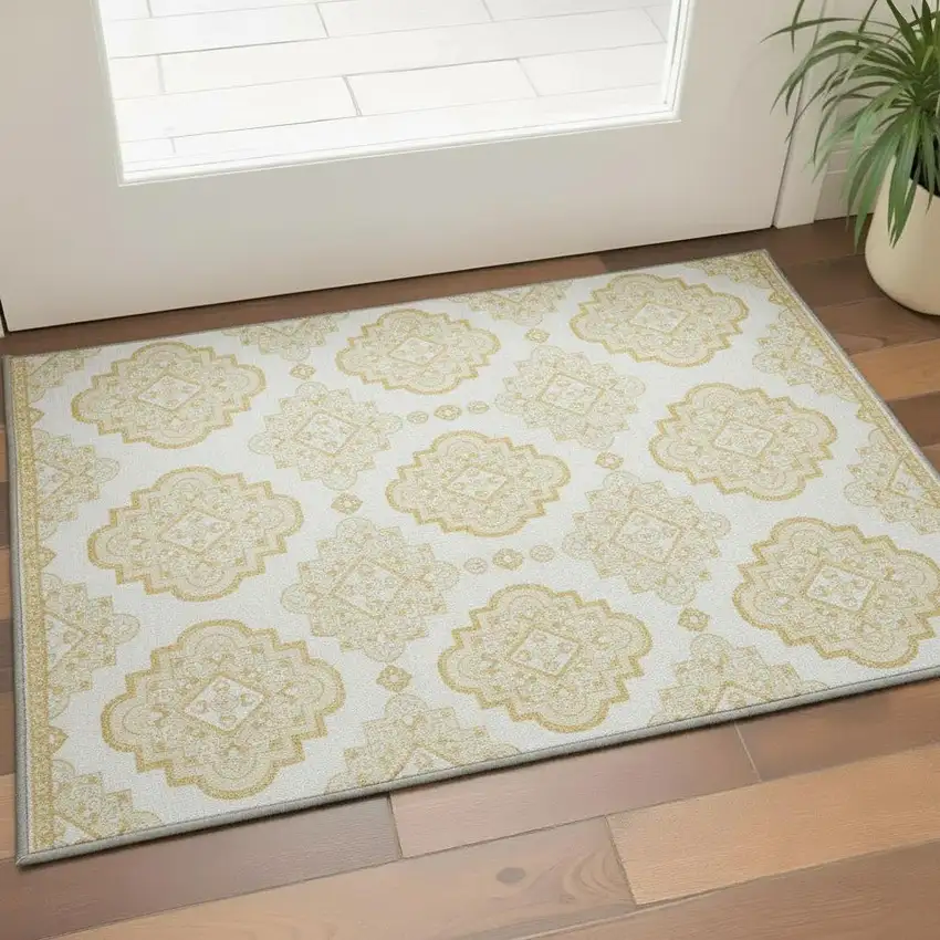 Gold And Ivory Medallion Washable Area Rug With UV Protection Photo 2