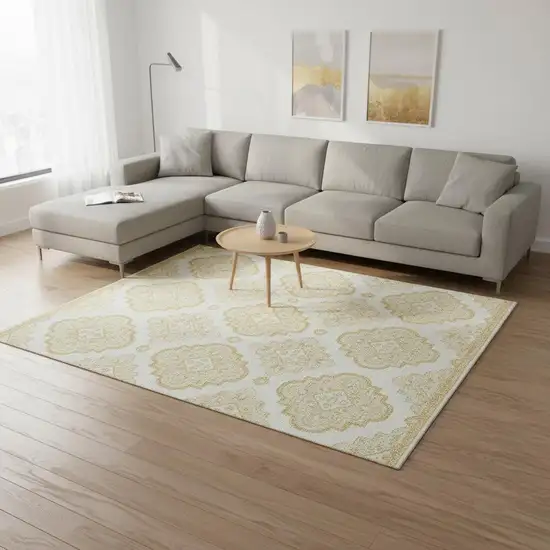 Gold And Ivory Medallion Washable Area Rug With UV Protection Photo 2