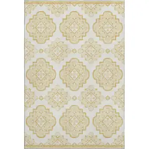 Photo of Gold And Ivory Medallion Washable Area Rug With UV Protection