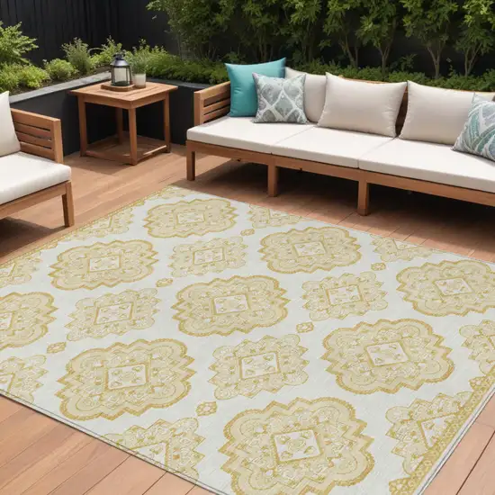 Gold And Ivory Medallion Washable Indoor Outdoor Area Rug Photo 1